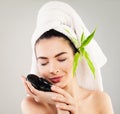 Spa Model Woman with White Bath Towel and Natural Green Leaves Royalty Free Stock Photo