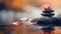 Spa - Natural Alternative Therapy With Massage Stones And Waterlily In Water Royalty Free Stock Photo