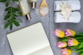 Spa with natural olive soap, tulips and sea salt and an open notebook for writing Royalty Free Stock Photo