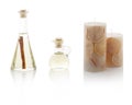 Spa oils in bottles and scented candles. With PS paths. Royalty Free Stock Photo