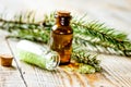 Spa with organic spruce oil and sea salt in glass bottles on woo Royalty Free Stock Photo