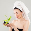 Spa Portrait of Healthy Woman with Black Stones and Green Bamboo Royalty Free Stock Photo