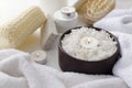 Spa procedures. Candles, sea salt, towels, brushes, sponges for massage and shower Royalty Free Stock Photo