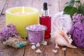 Spa products and accessories. Aromatic oil, soap, sea salt, towels and candle Royalty Free Stock Photo