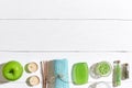 Spa products. Bath salts, soap, candles and towel. Flat lay on white wooden background, top view. Royalty Free Stock Photo