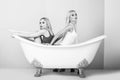 Spa and relaxation, pretty girls in white bath Royalty Free Stock Photo