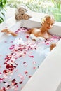 Spa Relaxation. Woman Body Care. Flower Bath. Beauty Skincare Royalty Free Stock Photo