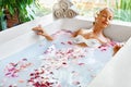 Spa Relaxation. Woman Body Care. Flower Bath. Beauty Skincare