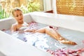 Spa Relaxation. Woman Body Care. Flower Bath. Beauty Skincare Royalty Free Stock Photo