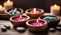 Spa resort concept - Close up of floating aromatherapy candles in wooden bowls Royalty Free Stock Photo