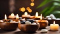 Spa resort concept - Close up of floating aromatherapy candles in wooden bowls Royalty Free Stock Photo