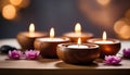 Spa resort concept - Close up of floating aromatherapy candles in wooden bowls Royalty Free Stock Photo