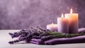 Spa resort concept - Close up of lilac with towels, candles and stones