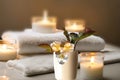 spa salon soft lighting Candles,roses , roses flowers, aromatherapy, soft candle light, cozy meditation background Royalty Free Stock Photo