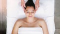 Spa, salon and woman relax for head massage, facial treatment and luxury pamper. Aesthetic, skincare and above of person