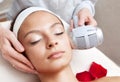 Spa salon: Young Beautiful Woman Having Facial Massage Royalty Free Stock Photo