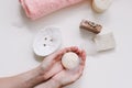 Spa set. Bar of handmade soap, candle and towel. Accessories for personal hygiene. Decor for bathroom interior Royalty Free Stock Photo