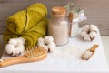 Spa set with bath solt, comb, towel and cotton flower on white background.