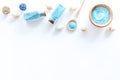 Spa set with blue sea salt for bath and shell white background top view mockup Royalty Free Stock Photo