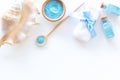 Spa set with blue sea salt for bath and shell white background top view mockup Royalty Free Stock Photo