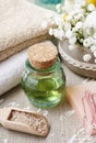 Spa set: bottle of essential oil, soft towels, bar of soap Royalty Free Stock Photo