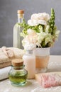 Spa set: bottle of essential oil, soft towels, bar of soap Royalty Free Stock Photo