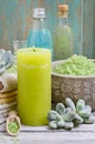 Spa set: green sea salt, scented candles, liquid soap and essent Royalty Free Stock Photo