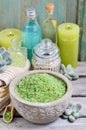 Spa set: green sea salt, scented candles, liquid soap and essent Royalty Free Stock Photo