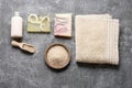 Spa set: liquid soap, bars of handmade soap, sea salt and towel. Royalty Free Stock Photo