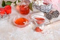 Spa set: scented candle, sea salt, liquid soap and romantic red roses Royalty Free Stock Photo