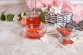 Spa set: scented candle, sea salt, liquid soap and romantic red roses Royalty Free Stock Photo