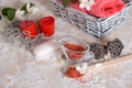 Spa set: scented candle, sea salt, liquid soap and romantic red roses Royalty Free Stock Photo