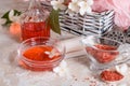 Spa set: scented candle, sea salt, liquid soap and romantic red roses Royalty Free Stock Photo