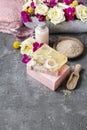 Spa set: sea salt, bars of handmade soap and liquid soap. Bouque Royalty Free Stock Photo