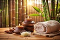 Spa Setting in Brown Tone on Sunlit Bamboo Background Royalty Free Stock Photo