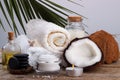 Spa setting and health care items, coconut,body oil,bath salt,mi