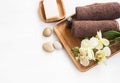 Spa setting with towels , orchid flower, soap and massage stones