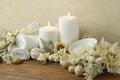 Spa setting with white burning candles and potpourri. Spa still life Royalty Free Stock Photo