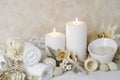 Spa setting with white burning candles and potpourri. Spa still life Royalty Free Stock Photo