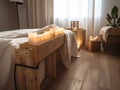 Spa setting with a wooden massage table