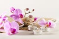 Spa still life with aromatic candles, orchid flower Royalty Free Stock Photo