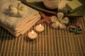 Spa still life with aromatic candles,white flower ,soap and towel