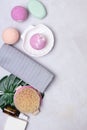 SPA Still Life Background Pink and Light Orange Bath Bombs Soaps Cosmetic Oil on Light Gray Background Washing Brush Gray and Pink Royalty Free Stock Photo