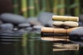 Spa still life with bamboo and zen stones with water surface. Generative AI Royalty Free Stock Photo