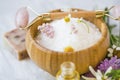 Spa still life bath salt with essential oils and medicinal healing herbs Royalty Free Stock Photo