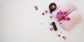 Spa still life with candle, towels and rose oil Royalty Free Stock Photo