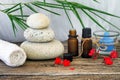 Spa still life with candle,zen stone and essential oil Royalty Free Stock Photo