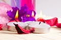 Spa still-life - candles and petals Royalty Free Stock Photo