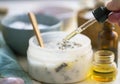 Spa still life with essential oil and homemade salt scrub Royalty Free Stock Photo