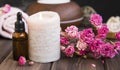 Spa still life with roses, candle and oil bottle.Wellness setting spa Royalty Free Stock Photo